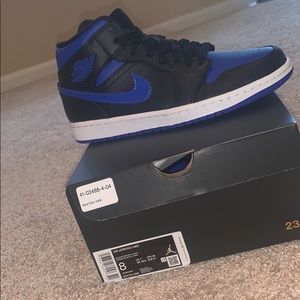 Black and royal Jordan 1s mids